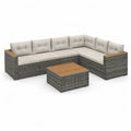 Set divano da giardino angolare 5 posti con tavolino 230 x 180 x 65 cm in rattan PE grigio con cuscini beige