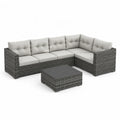 Set divano angolare da giardino 5 posti con tavolino 250 x 190 cm in rattan PE grigio e cuscini beige
